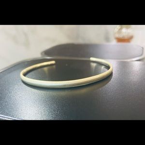 Very thin Kendra Scott gold bangle